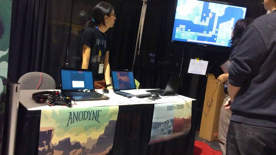 Marina tabling Anodyne and Even the Ocean at a video game convention.