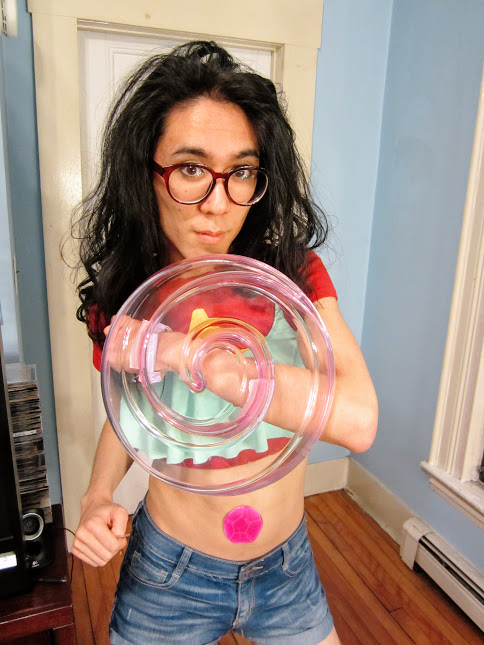 Marina as Stevonnie, posing with shield up.