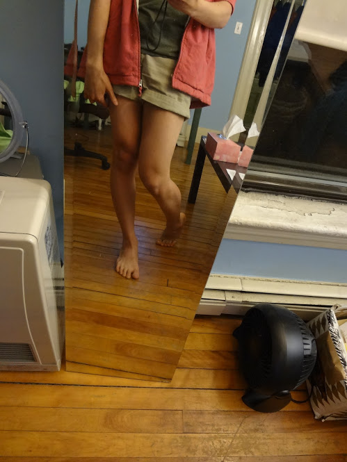 A mirror selfie showing Marina's shaven legs