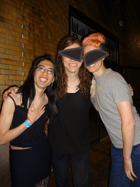 Marina and Alex take a photo with Against Me! frontwoman in the street next to the venue.